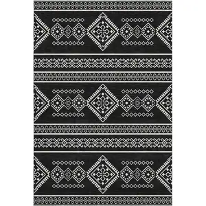 Photo of Black And Ivory Southwestern Washable Area Rug With UV Protection