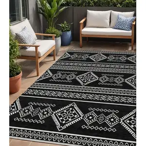 Photo of Black And Ivory Southwestern Washable Indoor Outdoor Area Rug