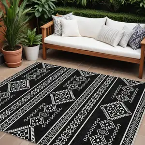 Photo of Black And Ivory Southwestern Washable Indoor Outdoor Area Rug