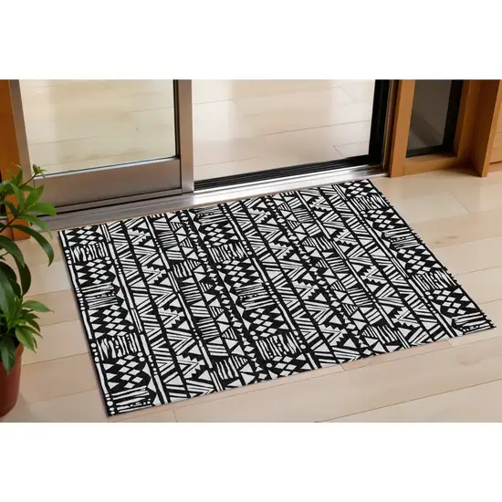 Black And Ivory Southwestern Washable Indoor Outdoor Area Rug Photo 1