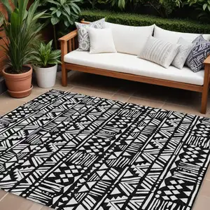 Photo of Black And Ivory Southwestern Washable Indoor Outdoor Area Rug