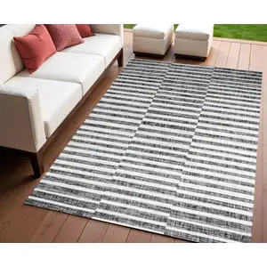Photo of Black And Ivory Striped Indoor Outdoor Area Rug