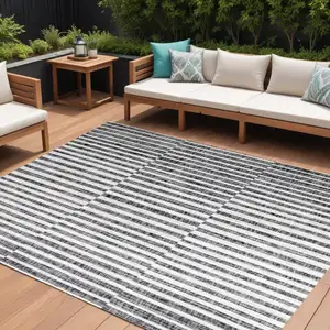 Photo of Black And Ivory Striped Indoor Outdoor Area Rug