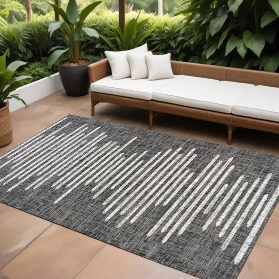 Black And Ivory Striped Indoor Outdoor Area Rug Photo 1