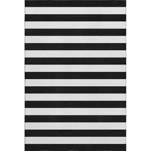 Photo of Black And Ivory Striped Washable Area Rug With UV Protection