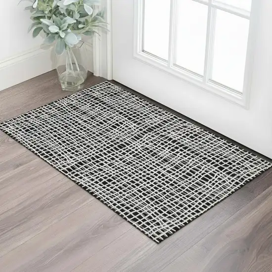 Black And Ivory Striped Washable Area Rug With UV Protection Photo 1
