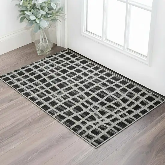 Black And Ivory Striped Washable Area Rug With UV Protection Photo 2