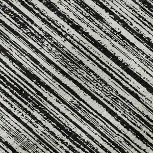 Photo of Black And Ivory Striped Washable Area Rug With UV Protection