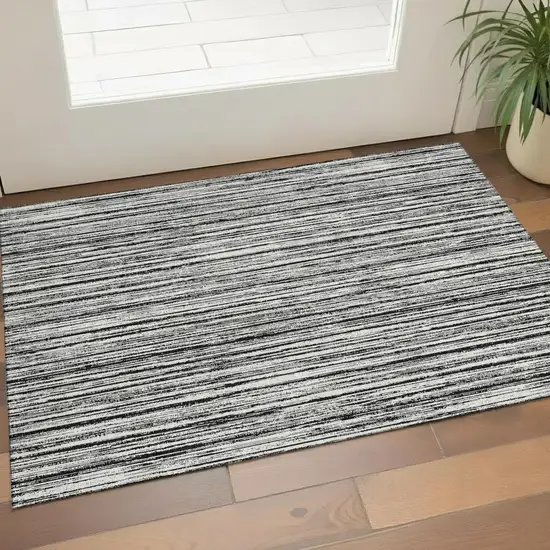 Black And Ivory Striped Washable Area Rug With UV Protection Photo 1
