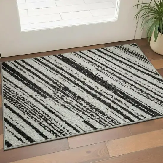 Black And Ivory Striped Washable Area Rug With UV Protection Photo 2