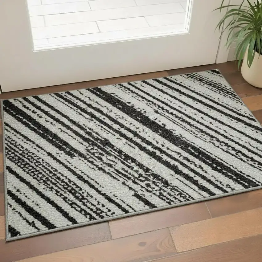 Black And Ivory Striped Washable Area Rug With UV Protection Photo 2
