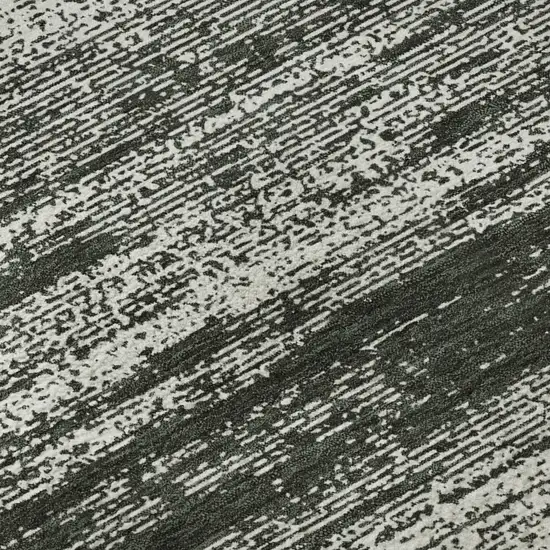 Black And Ivory Striped Washable Area Rug With UV Protection Photo 1