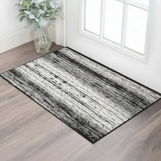Black And Ivory Striped Washable Area Rug With UV Protection Photo 1