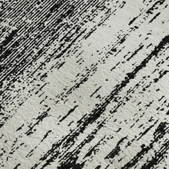 Black And Ivory Striped Washable Area Rug With UV Protection Photo 4