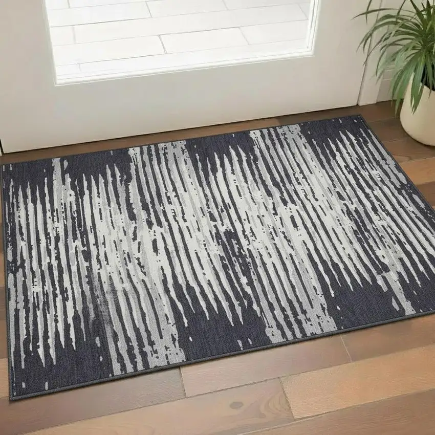 Black And Ivory Striped Washable Area Rug With UV Protection Photo 1