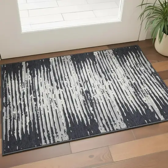 Black And Ivory Striped Washable Area Rug With UV Protection Photo 2