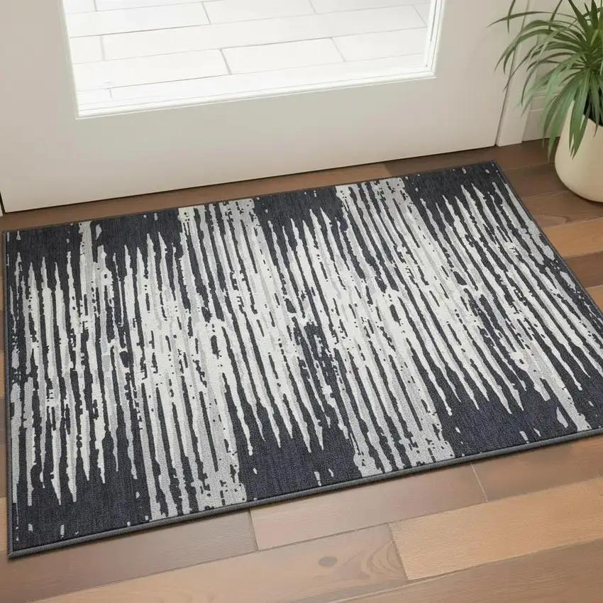 Black And Ivory Striped Washable Area Rug With UV Protection Photo 2
