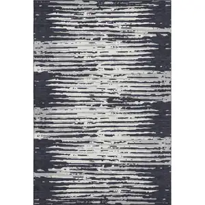 Photo of Black And Ivory Striped Washable Area Rug With UV Protection