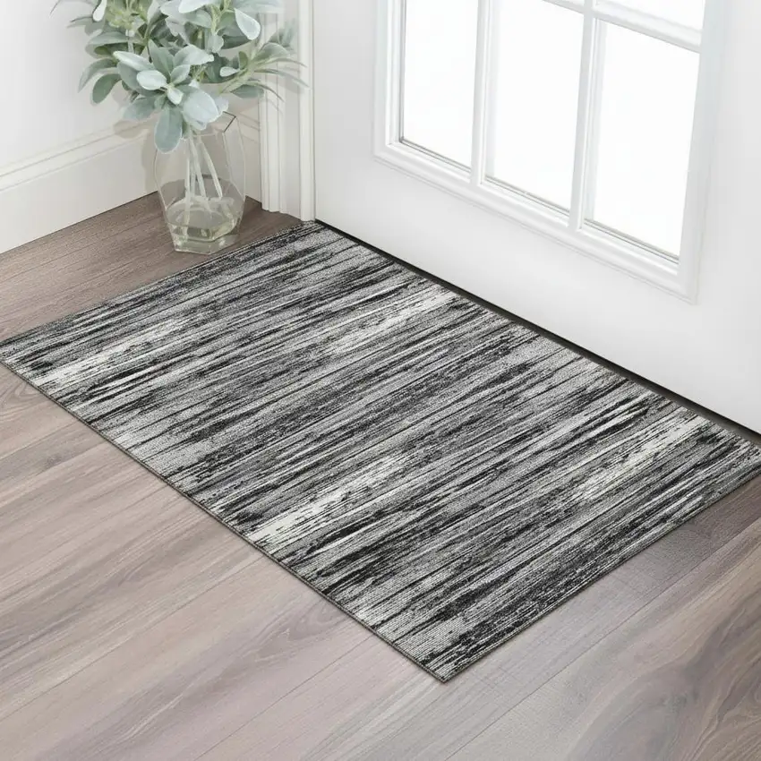 Black And Ivory Striped Washable Area Rug With UV Protection Photo 1