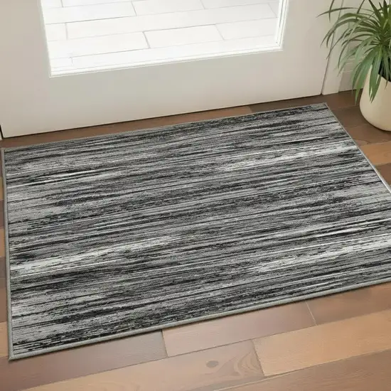 Black And Ivory Striped Washable Area Rug With UV Protection Photo 2