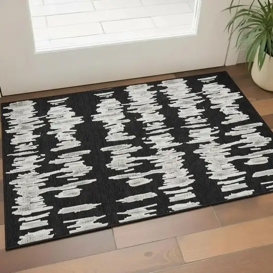 Black And Ivory Striped Washable Area Rug With UV Protection Photo 1