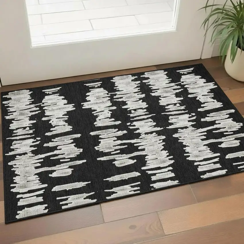 Black And Ivory Striped Washable Area Rug With UV Protection Photo 1