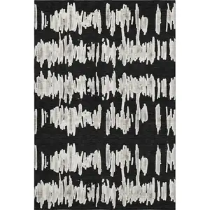 Photo of Black And Ivory Striped Washable Area Rug With UV Protection