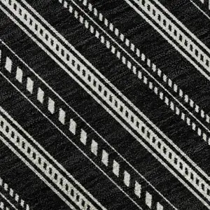 Photo of Black And Ivory Striped Washable Area Rug With UV Protection