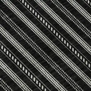 Photo of Black And Ivory Striped Washable Area Rug With UV Protection