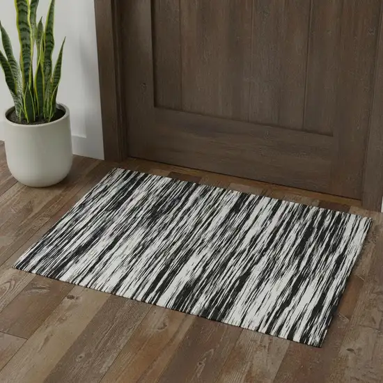 Black And Ivory Striped Washable Area Rug With UV Protection Photo 1