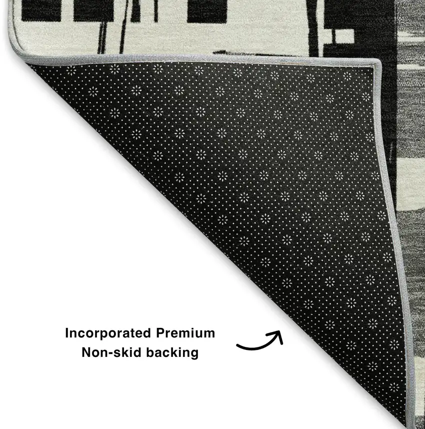 Black And Ivory Striped Washable Area Rug With UV Protection Photo 6