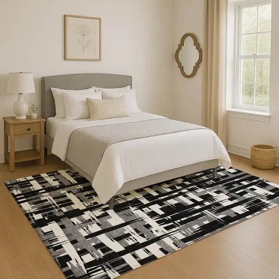 Black And Ivory Striped Washable Area Rug With UV Protection Photo 4