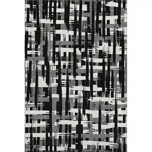 Photo of Black And Ivory Striped Washable Area Rug With UV Protection