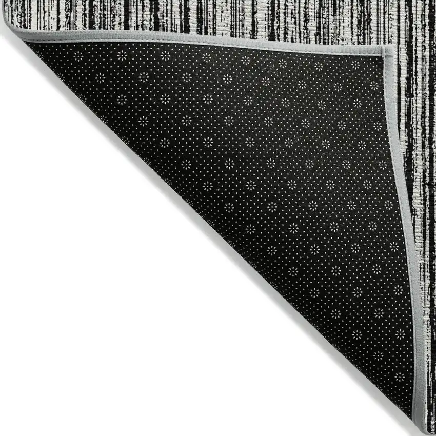 Black And Ivory Striped Washable Indoor Outdoor Area Rug Photo 3