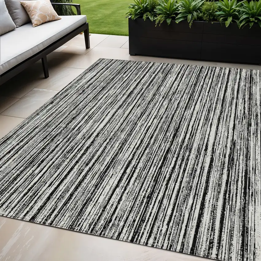 Black And Ivory Striped Washable Indoor Outdoor Area Rug Photo 1
