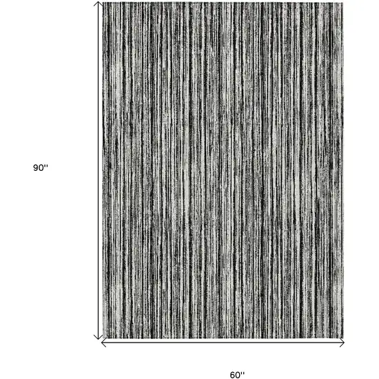 Black And Ivory Striped Washable Indoor Outdoor Area Rug Photo 3