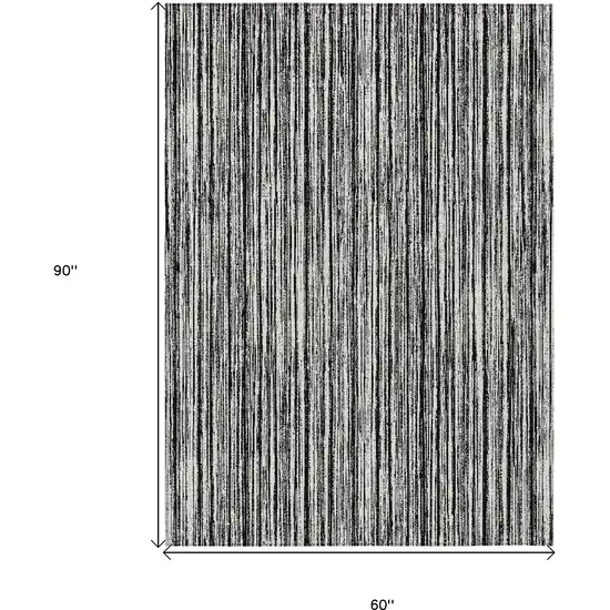 Black And Ivory Striped Washable Indoor Outdoor Area Rug Photo 3