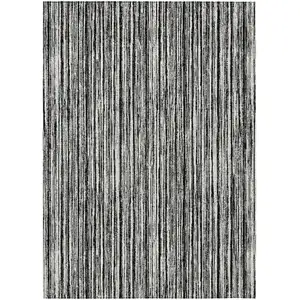 Photo of Black And Ivory Striped Washable Indoor Outdoor Area Rug