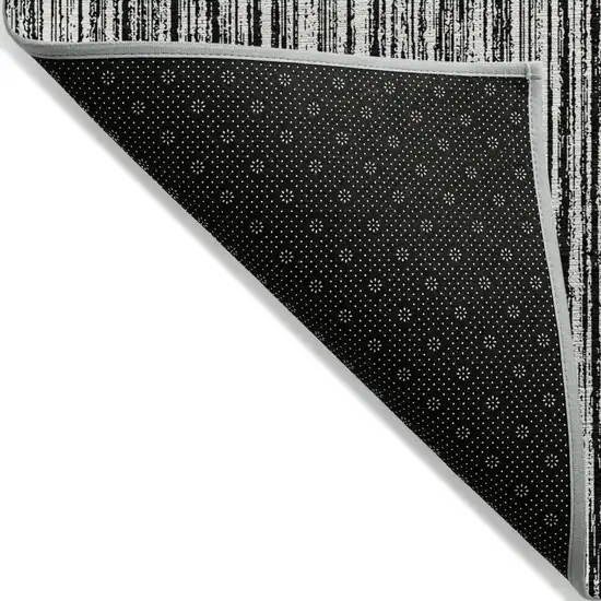 Black And Ivory Striped Washable Indoor Outdoor Area Rug Photo 2