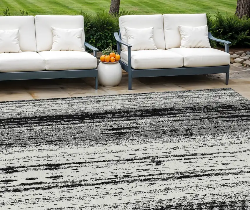 Black And Ivory Striped Washable Indoor Outdoor Area Rug Photo 1