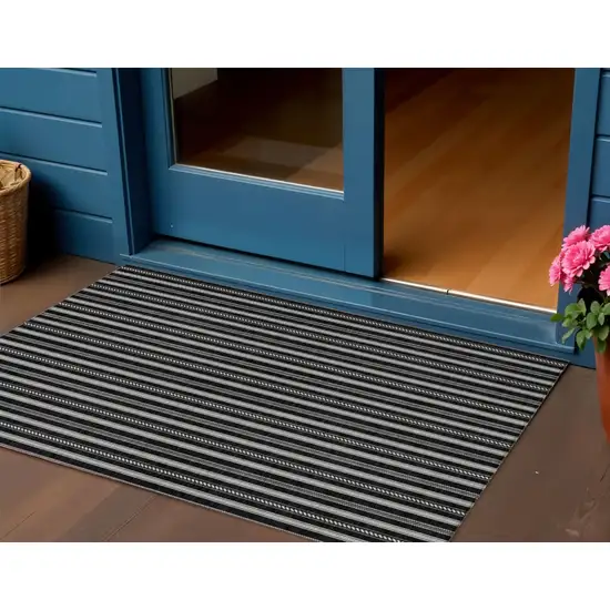 Black And Ivory Striped Washable Indoor Outdoor Area Rug Photo 1
