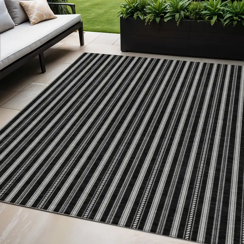 Black And Ivory Striped Washable Indoor Outdoor Area Rug Photo 1