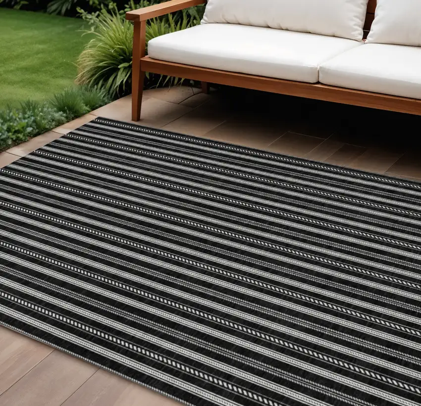 Black And Ivory Striped Washable Indoor Outdoor Area Rug Photo 1
