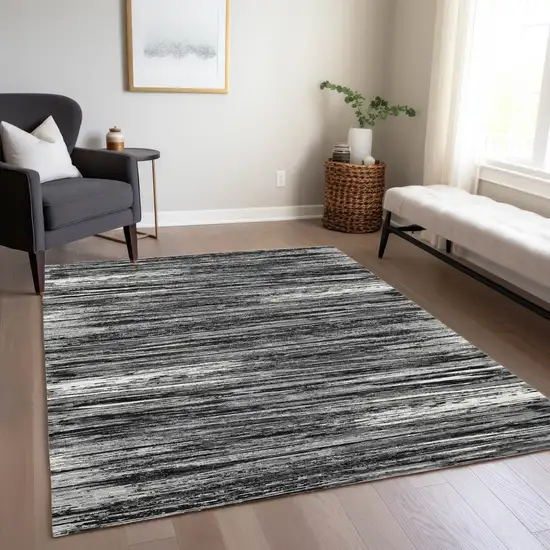 Black And Ivory Striped Washable Indoor Outdoor Area Rug Photo 9