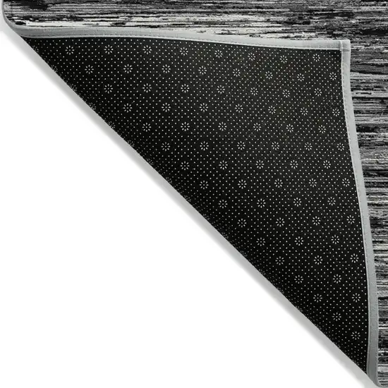 Black And Ivory Striped Washable Indoor Outdoor Area Rug Photo 3