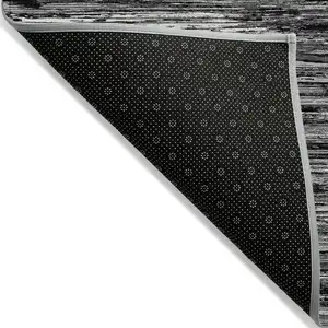 Photo of Black And Ivory Striped Washable Indoor Outdoor Area Rug