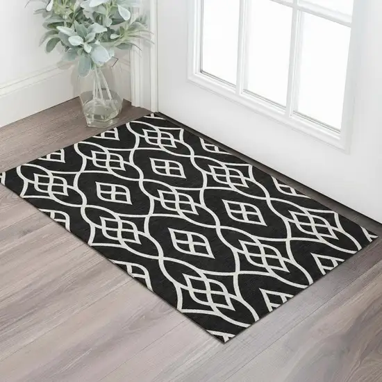 Black And Ivory Trellis Washable Area Rug With UV Protection Photo 1