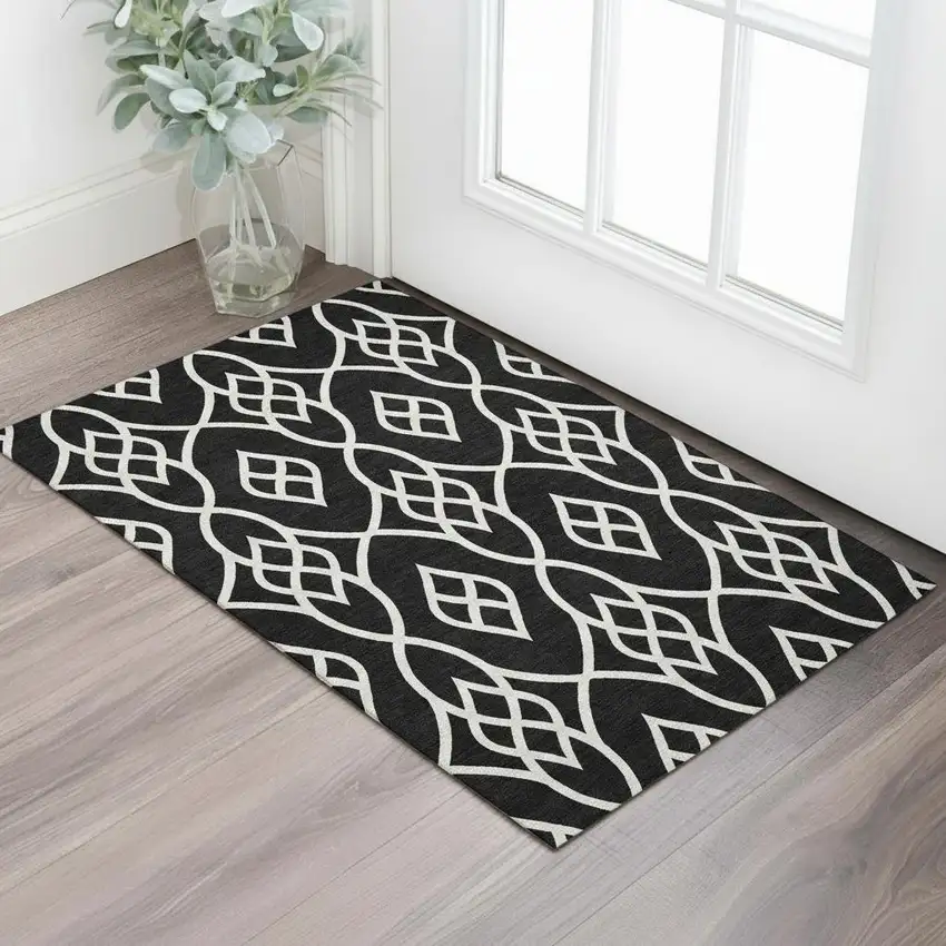 Black And Ivory Trellis Washable Area Rug With UV Protection Photo 1