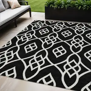Photo of Black And Ivory Trellis Washable Indoor Outdoor Area Rug
