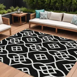 Photo of Black And Ivory Trellis Washable Indoor Outdoor Area Rug